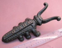 Cast Iron Beetle / Cricket Boot Jack with Advertising