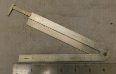 E. P. Johnsons No 45 German Silver 1' Caliper Rule w/ Protractor Bevel