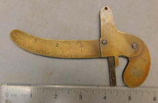 Antique Brass Pistol Grip Measure