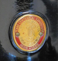 1936 Black Singer Featherweight 221 Texas Centennial Exposition badge