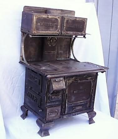 Small Antique Crescent Cast Iron Stove Auction