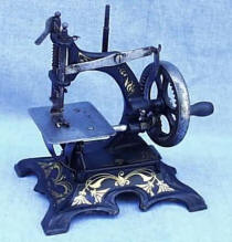 Muller 
	20 Cast Iron Small Antique Sewing Machine