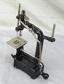 Peerless 
	Automatic Antique Cast Iron Sewing Machine