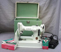 White 
	Singer Featherweight 221K Sewing Machine